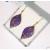 Violet earrings with handmade wire pattern